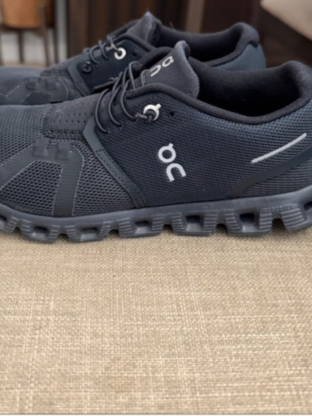 On Running Women Athletic Shoes in Black with White Logo